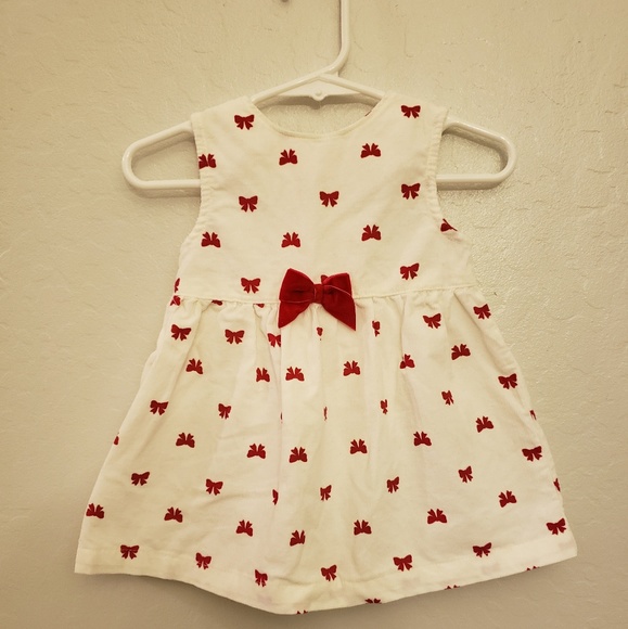 white dress with red bow